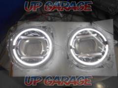 Unknown Manufacturer
With lighting ring
Headlight cover
[Jimny
JB64W