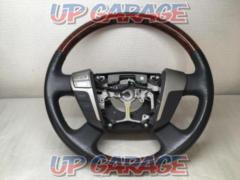 Toyota genuine
Genuine wood combination steering wheel for the 20 series Alphard/Vellfire