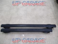 Aero base carrier for roof rail vehicles
