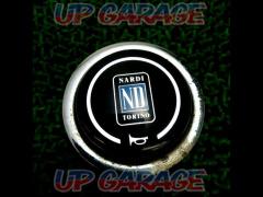 NARDI
Horn button (with trumpet mark)
)