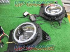 Unknown Manufacturer
Squid rings with projector headlights
