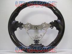 has been price cut 
REAL
Black carbon steering
[Noah / 80-series]
Product number: R80-BKC-BK