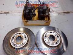 Toyota
Genuine front brake caliper & rotor set
