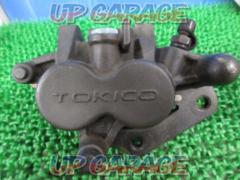 TOKICO right 2P caliper
Mounting pitch 58mm
Model unknown