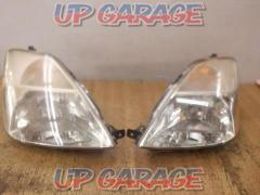 Left and right set Nissan genuine headlights