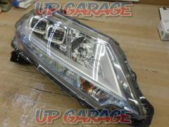 Genuine Honda headlight only on the right side