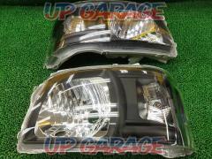 Unknown Manufacturer
Inner black headlight
Right and left
