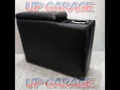 Unknown Manufacturer
Faux leather-covered center console box