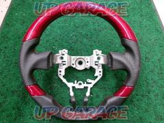 REAL
D-shape red carbon steering wheel