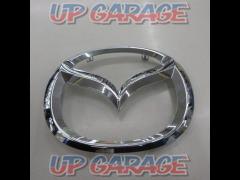 Mazda genuine
emblem