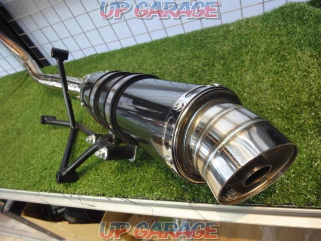 Unknown Manufacturer
Outside muffler
It seems to be in the 125cc class.-06