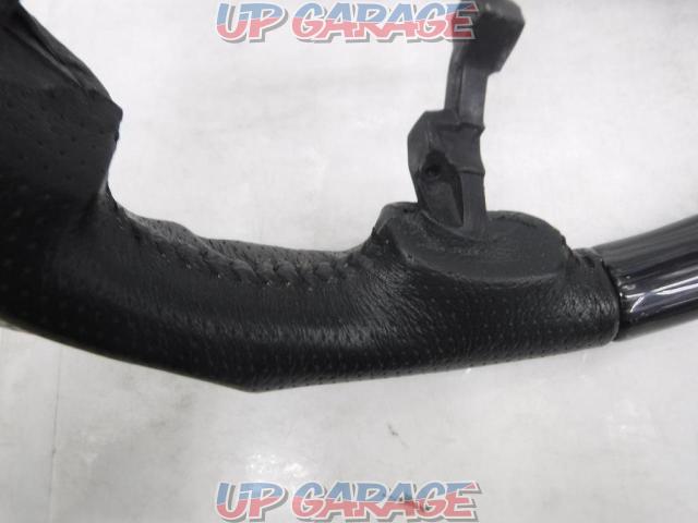 Unknown Manufacturer
Punching leather x gun grip steering-04