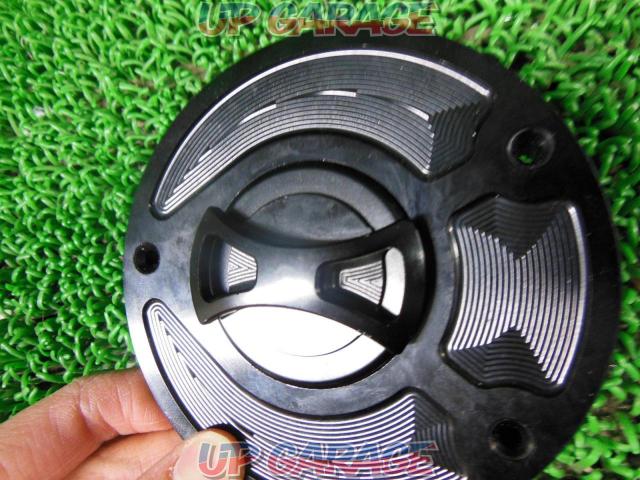 Manufacturer unknown aluminum keyless tank cap
Removal of CBR 600 RR (PC 40)-02