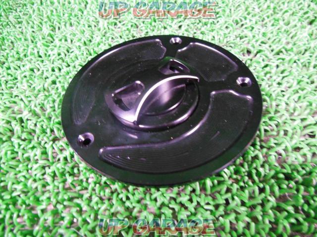 Manufacturer unknown aluminum keyless tank cap
Removal of CBR 600 RR (PC 40)-05