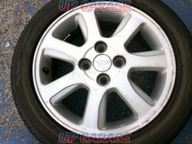 Daihatsu genuine 7 spoke aluminum wheels + MARQUIS
CST
MR61-02